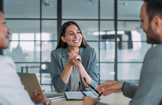 Two people meeting with a mortgage loan officer
