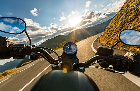 Motorcyclist cruises down the interstate.