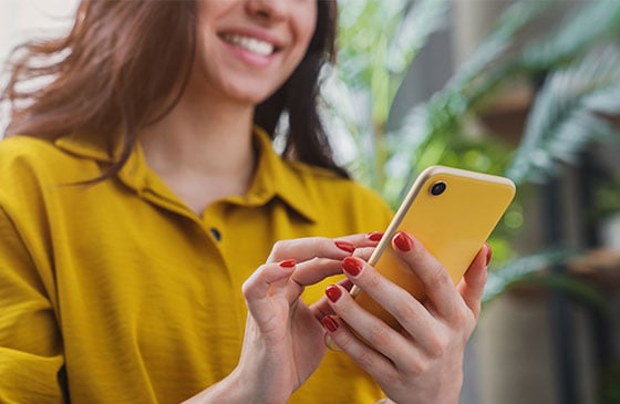 Person using phone to access checking account