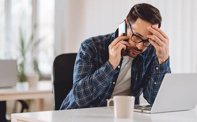 Frustrated man on phone