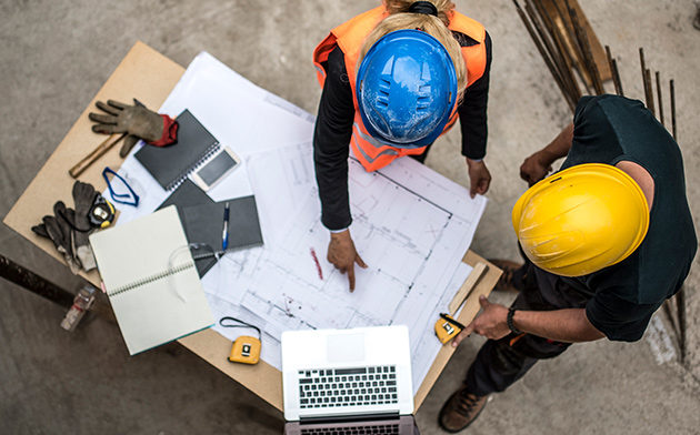 Contractors looking at plans