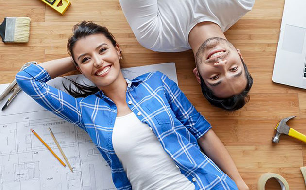 Couple Working On Home Improvement Projects