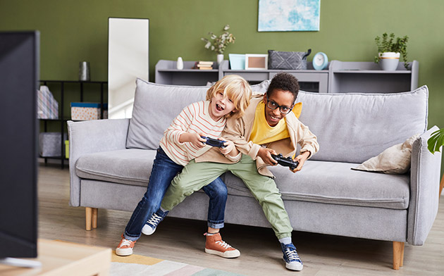 Two kids playing video games