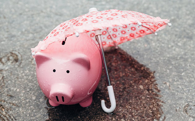 Piggy bank with umbrella