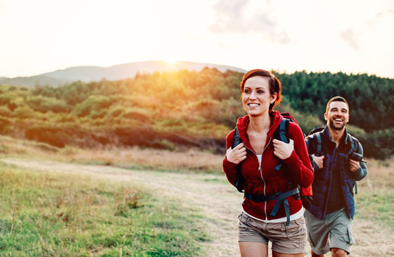 Couple hiking outdoors together