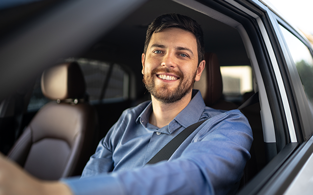 Young man in car