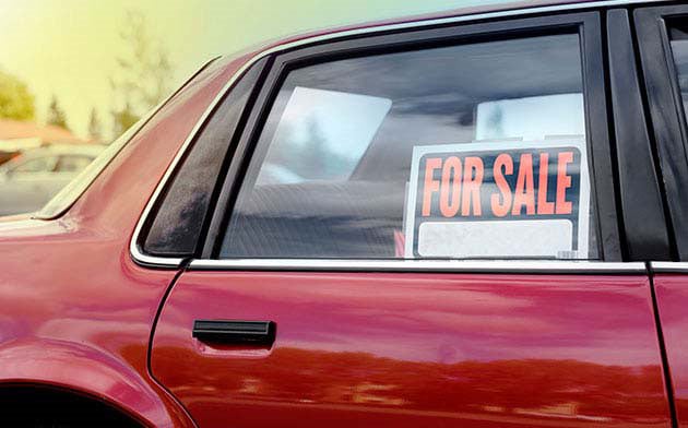 Car with for sale sign 