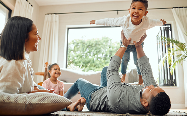 Couple having fun with their children