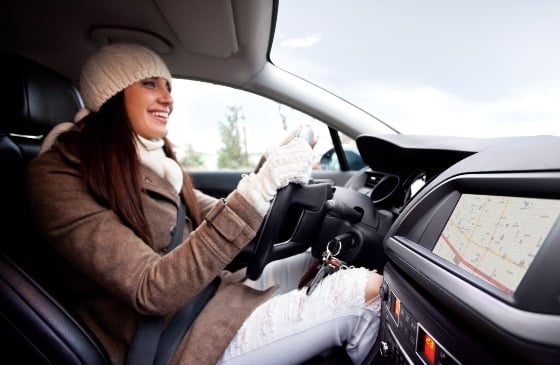 Women driving a car.