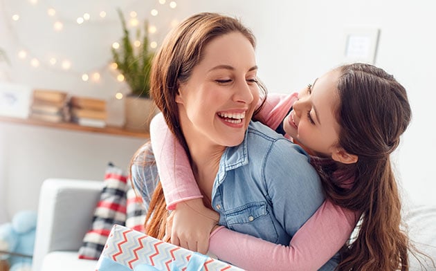 Mother and daughter embracing