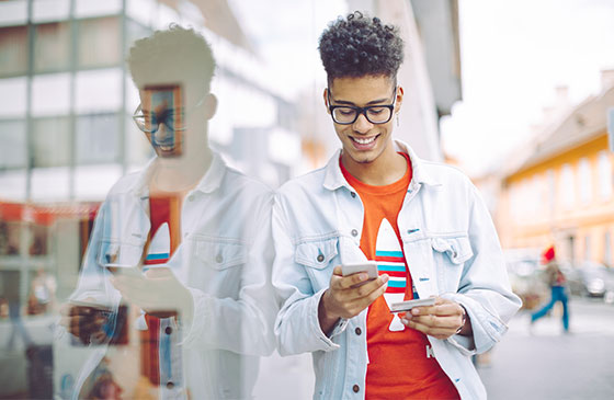 Teen checking phone to update account information