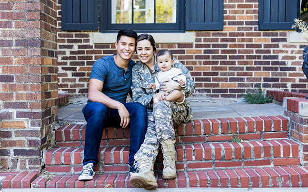 Young soldier with her family
